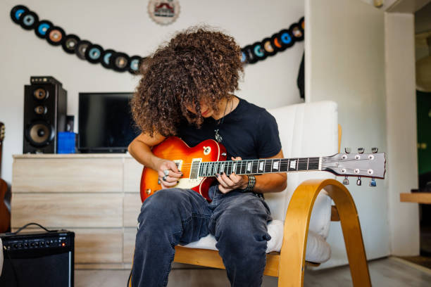istock Boy enjoys electric guitar 1705803416