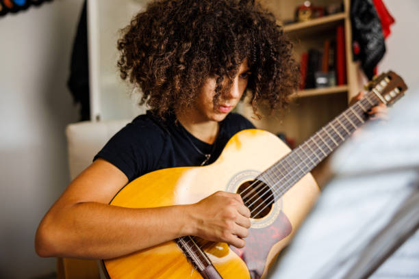istock Young musician play acoustic guitar 1705803482