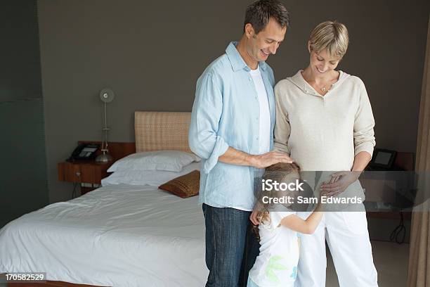 Father Mother And Daughter Smiling Stock Photo - Download Image Now - 30-34 Years, 30-39 Years, 35-39 Years