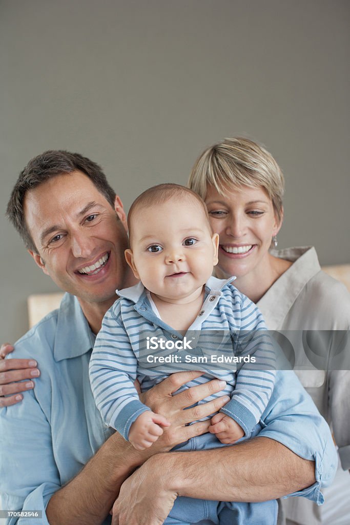 Mother, father and son smiling  30-34 Years Stock Photo