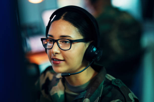 istock Woman, call center and face with microphone and glasses for information technology, big data or intelligence agency. Cyber security, person and smile for communication, analysis and support to army 1705843569