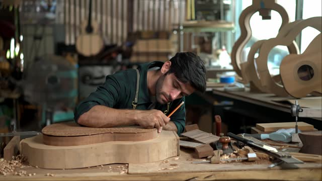 Guitar Luthier Ensures Back and Body Match in Mold