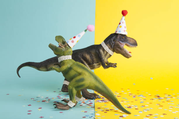 istock a pair of dinosaurs celebrating on a confetti carpet 1705849529
