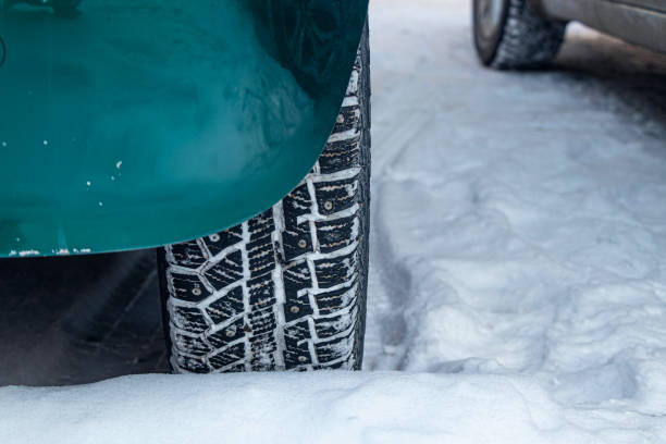 istock closeup of winter wheels on white snow 1705856982