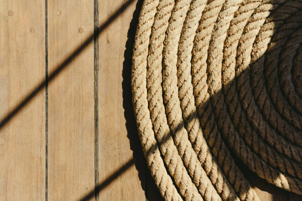 istock Large rolled-up boat dock with dark background. 1705863888