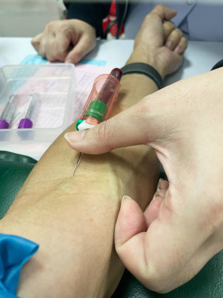 istock A nurse drawing blood from patient vein 1705866380