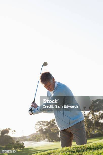 Man Playing Golf In Sand Trap Stock Photo - Download Image Now - 45-49 Years, Adult, Adults Only