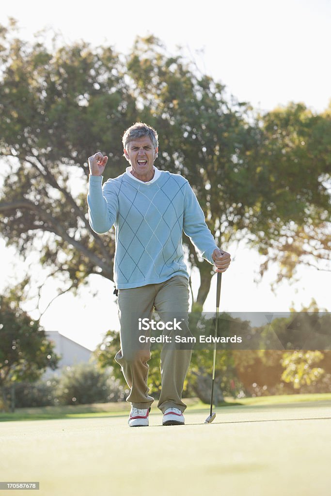 Homem jogando golfe - Foto de stock de 45-49 anos royalty-free