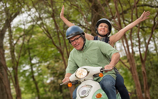 istock Elderly couple enjoying ride on a scooter 170587976