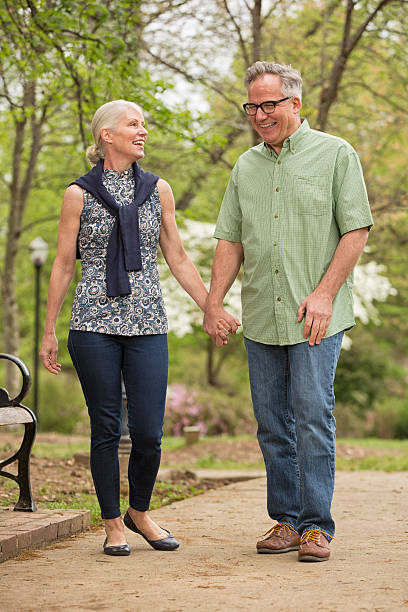 istock Couple Enjoying a walk in the park 170587981