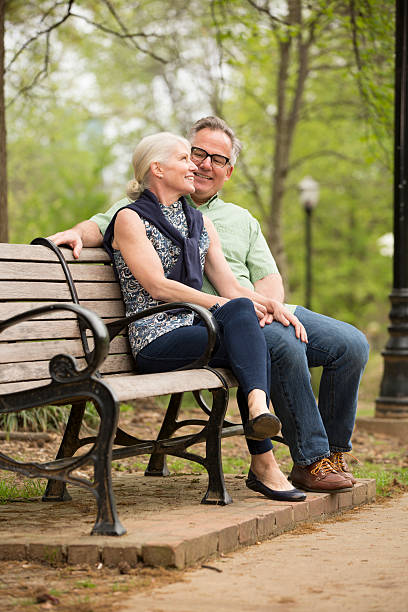 istock Couple sitting in the park 170588002