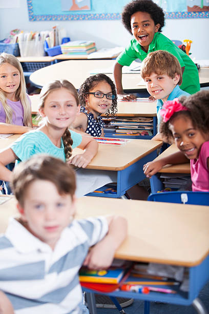 istock Group of children in classroom 170588335