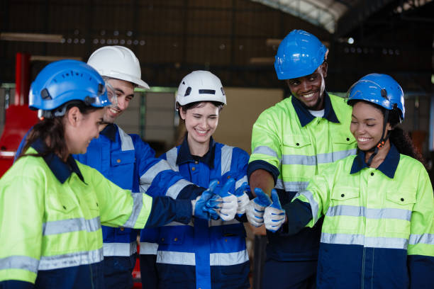 istock Successful cheerful and smiling engineer automation robot technician joining thumb up show hand. Teamwork engineering agreement connection partnership success project. Team maintenance robotic. 1705897986