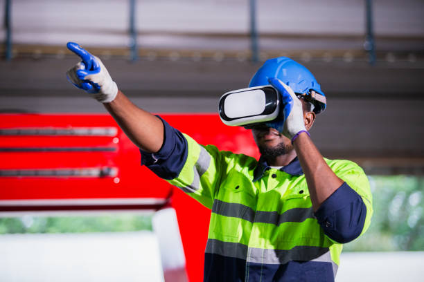 istock engineer man african american using virtual reality glasses. goggles innovation future watching education internet. 1705903740