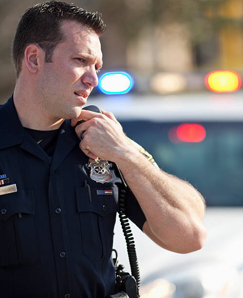 istock Police officer on radio 170590919