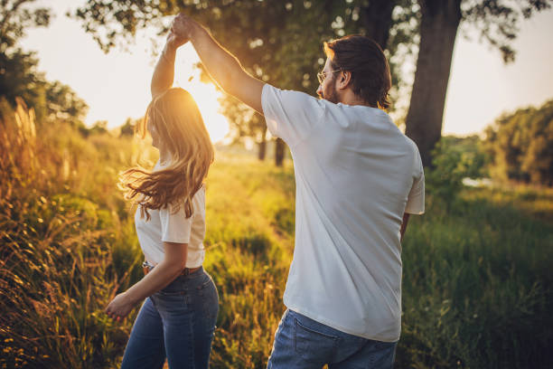 istock Happy couple dancing in nature 1705914837