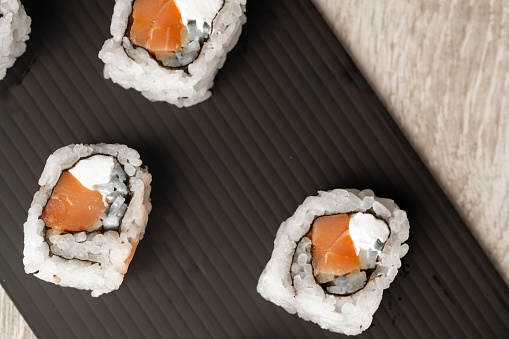 set of fresh sushi rolls with salmon