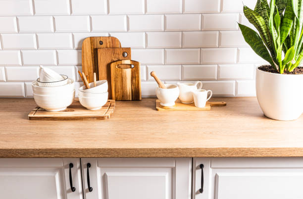 istock Kitchen background with a set of various kitchen tools and utensils made of natural environmentally friendly materials. Eco style on a modern kitchen. 1705941626