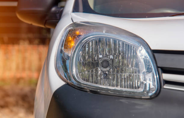 front of white commercial car van. half view of white car - protection insurance dark rain imagens e fotografias de stock