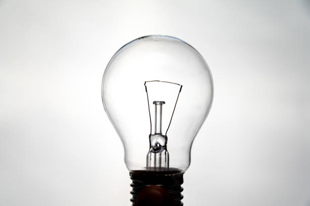 Fourlight bulbs stand on a wooden table