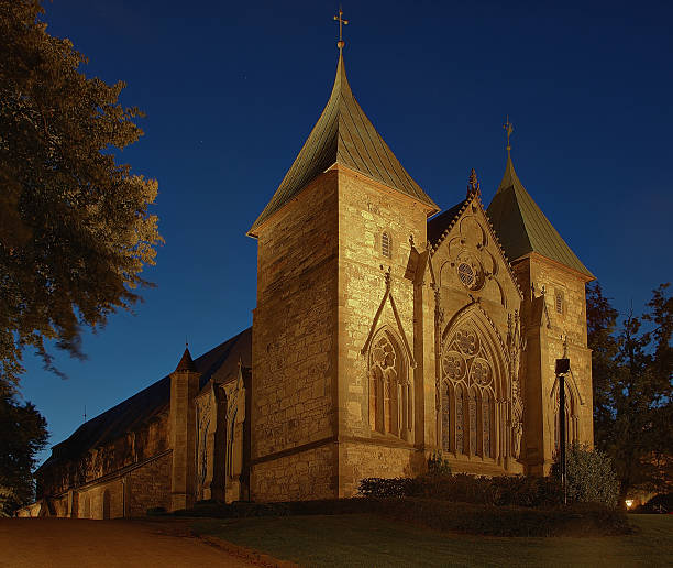 Cathedral at night in Stavanger, Norway. Cathedral bulit from 1125 in Anglo-Roman style. stavanger cathedral stock pictures, royalty-free photos & images