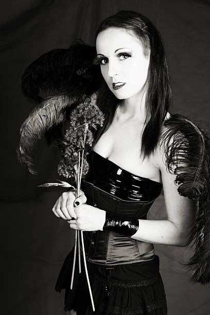 istock B&W of winged woman with flowers. 170596421
