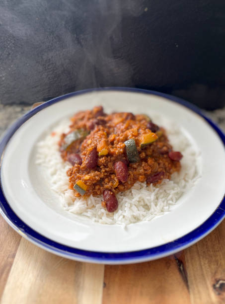 Chili con carne and boiled rice stock photo
