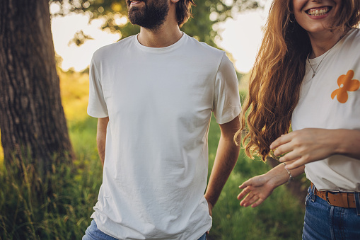 Man and woman, beautiful young couple in nature together.