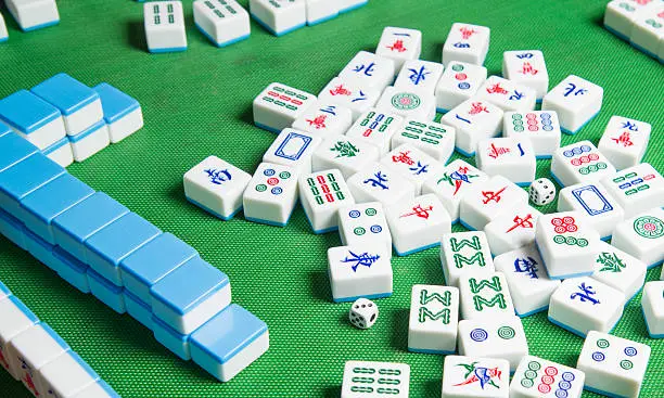 people palying mahjong game