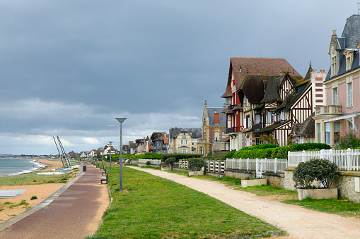 Saint-Cast-le-Guildo, France, August 28, 2023 - Beach promenade in Saint-Cast-le-Guildo in the department of Côtes-d'Armor in Brittany, France.