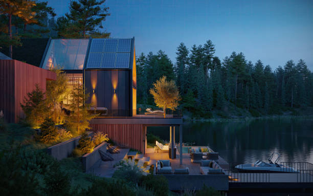 istock 3d render of a forest house by the lake surrounded by tree at night 1706031351
