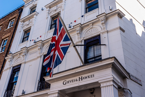 London, UK - August 27, 2023: Gieves and Hawkes bespoke tailoring banner store in Savile Row