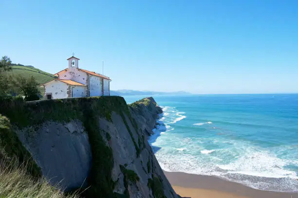 Panoramic of the hermitage of San Telmo and the cliffs of Itzurun beach in Zumaia, Basque Country, Spain