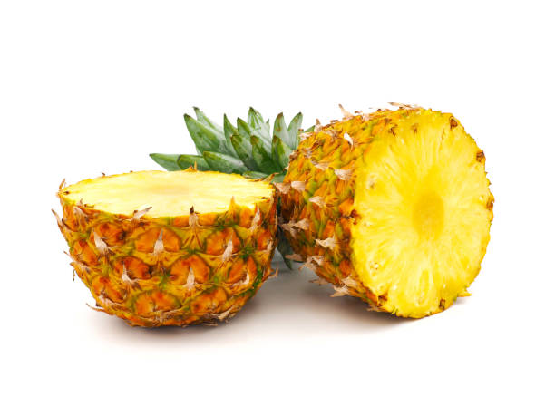 istock Two halves of pineapple fruit isolated on white background 1706125999