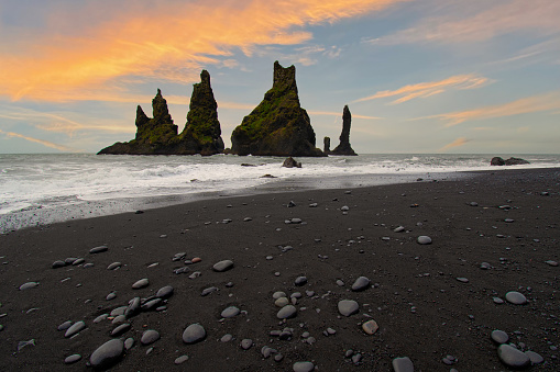 Beautiful Landscape of Black Pebbles Beach. Amazing View on the Basalt Cliffs and the Sea. Vik Myrdal. Iceland