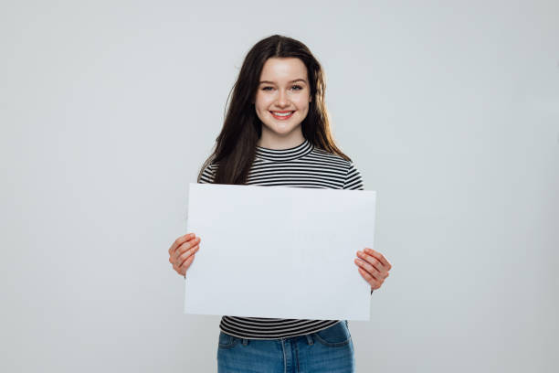 istock Teenager Holding Blank Sign 1706136652