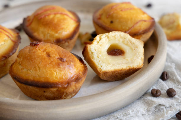 istock Pasticciotto leccese pastry filled with egg custard cream and sour cherry jam on a plate close up 1706151543