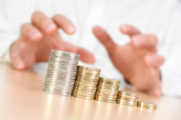istock Hands grabbing Euro coins 170615442