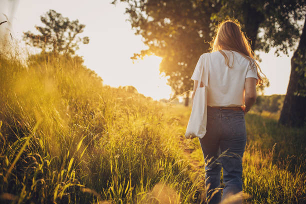istock Woman walking in nature 1706154798