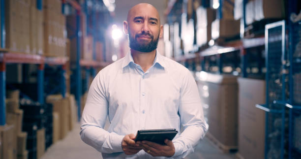 istock Manager, distribution warehouse and man with a tablet for logistics industry at factory. Manufacturing, supply chain and portrait of a person with technology for inventory, inspection or freight 1706156455