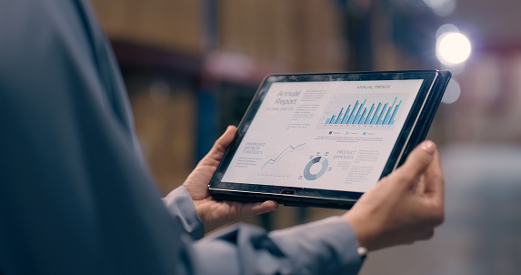 Tablet, hands and inventory management at warehouse, data analysis with supplier and person in logistics. Distribution, product inspection and analytics with digital information, storage and closeup