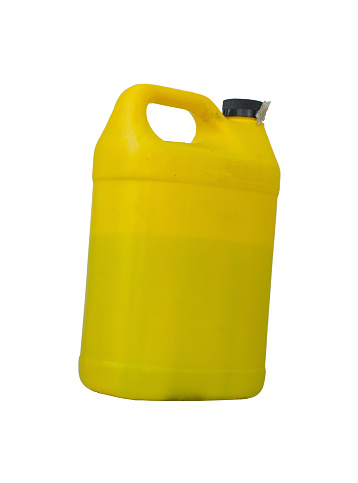 A yellow 2 gallon ,or 8 litre, plastic container about half full. A piece of cloth is used to help seal the bottle. Clipping path