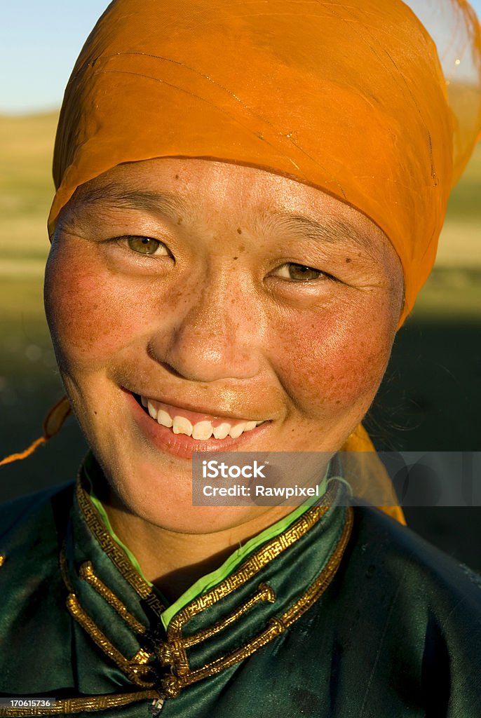 Asian Portraits Beautiful young Mongolian lady in the late afternoon sun. Adult Stock Photo