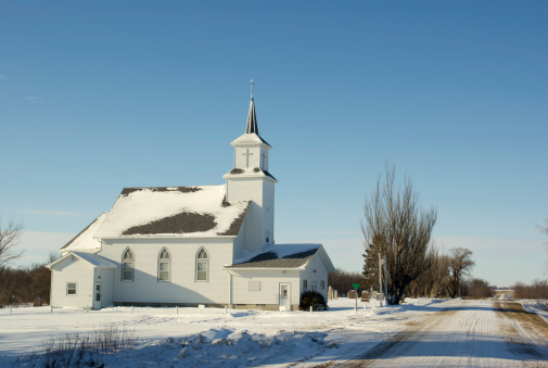 Traditional pioneer country church--winter scene in North Dakota, USA.