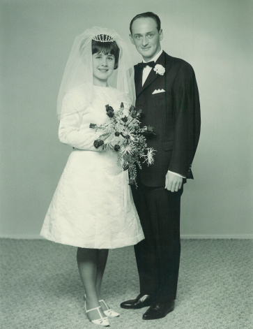 Stained vintage portrait of a caucasian couple on their wedding day back in 1966.Related images: