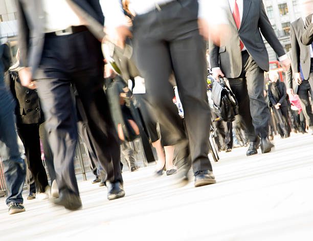 istock Crowd of commuters feet with movement blur, London UK 170616409