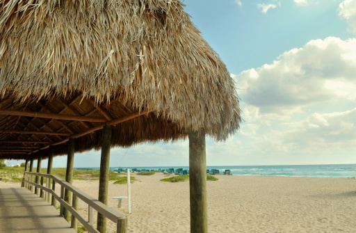 A beach hut near the ocean.