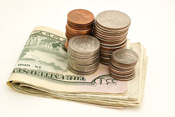 istock paper money and coin 170616633