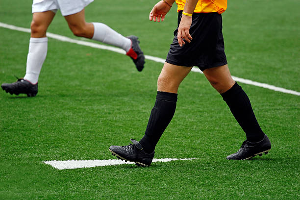 On the Soccer Field Soccer players on the field. lance armstrong foundation stock pictures, royalty-free photos & images