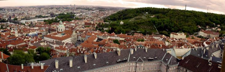 Sunset panorama of Prague and its old town, view from the tower of Hradcani castle.